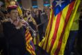 People gather in front of the Palau Generalitat in Barcelona, Spain awaiting for Catalan President Carles Puigdemont's ...