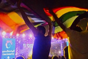 Image of two people holding up a rainbow flag at a concert in Cairo, Egypt Security officials said those arrested have ...