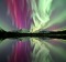 A reflection of northern lights over Annie Lake, Yukon.