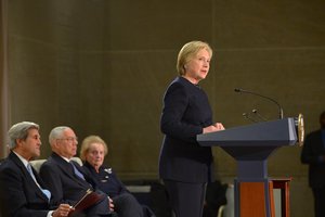 Former Secretary of State Hillary Rodham Clinton, flanked by Secretary of State John Kerry and former Secretaries of State Madeleine Albright and Colin L. Powell, delivers remarks at a reception celebrating the completion of the U.S. Diplomacy Center at the U.S. Department of State in Washington, D.C. on January 10, 2017.