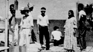 Does A Newly Discovered Photo Show Amelia Earhart Survived A Crash Landing?