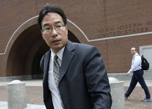 In this Sept. 19, 2017, file photo, Glenn Chin, supervisory pharmacist at the now-closed New England Compounding Center, leaves federal court after attending the first day of his trial in Boston