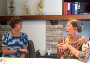 In this photo taken on Thursday, June 29, 2017, psychiatrist Dr. Lieve Thienpont, right, speaks with Amy de Schutter, who received approval for euthanasia about a year ago, in Ghent, Belgium, one of the few countries that allow for euthanasia.  Thienpont, a doctor, respected psychiatrist and prominent euthanasia advocate, believes that when modern medicine can’t relieve suffering, euthanasia, when doctors actively kill patients, should be an option. One of Thienpont’s patients, Amy de Schutter, says approving euthanasia for psychiatric patients can paradoxically save lives.  (AP Photo/Maria Cheng)