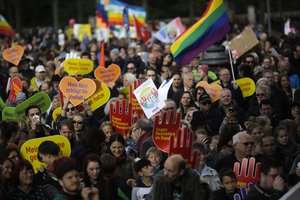 Thousands of people attend a demonstration with the slogan 'Against Hate and Racism at the Bundestag' in Berlin, Sunday, Oct. 22, 2017.