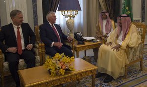 U.S. Secretary of State Rex Tillerson meets with Saudi King Salman, accompanied by U.S. Charge d'Affaires Christopher Henzel, at the Saudi Royal Court in Riyadh, Saudi Arabia, on October 22, 2017.