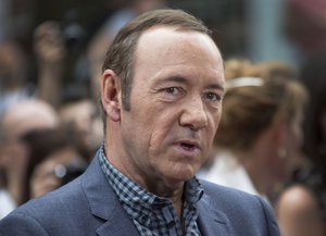 FILE - In a Monday, June 9, 2014 file photo, U.S. actor Kevin Spacey arrives for the European Premiere of Now, at a cinema in central London. A Massachusetts woman, Linda Louise Culkin of Quincy, Mass., who threatened to blow up, torture and castrate Spacey in what prosecutors called a “persistent and malevolent” cyberstalking campaign, was sentenced Wednesday, Sept. 17, 2014, to more than four years in prison.