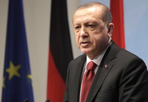 Turkish President Recep Tayyip Erdogan speaks during a press conference after the G-20 summit in Hamburg, northern Germany, Saturday, July 8, 2017