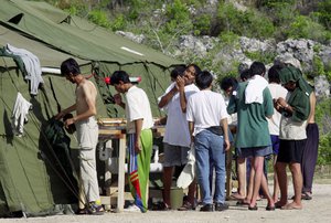 Human rights groups accused Australia on Wednesday, Aug. 3, 2016, of deliberately ignoring the abuse of asylum seekers being held at the remote Pacific island detention camp in a bid to deter future refugees from trying to reach the country by boat.