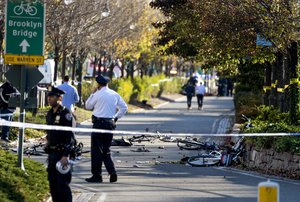 Bicycles and debris lay on a bike path near West and Houston Streets after people were injured after during incident on a bike path in New York Tuesday, Oct. 31, 2017. (AP Photo/Craig Ruttle)