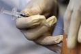 Claims Australians were given a "budget" flu vaccine that contributed to the high rates of flu and death have been ...