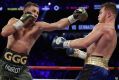 Gennady Golovkin, left, fights Canelo Alvarez during a middleweight title fight Saturday, Sept. 16, 2017, in Las Vegas. ...