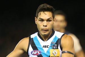 Hit in the pocket: Jarman Impey was fined $5000 by Port Adelaide this year.