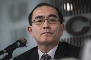 Former North Korean deputy ambassador to the UK, Thae Yong Ho, center, speaks with media at the Foreign Correspondents Club in Seoul, South Korea, Wednesday, Jan. 25, 2017.