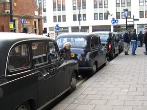 UK. Taxi parking in London. December 2009.