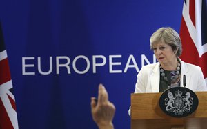 British Prime Minister Theresa May Theresa May speaks during a media conference at an EU summit in Brussels on Friday, Oct. 20, 2017.