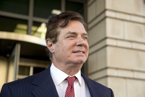 Paul Manafort, President Donald Trump's former campaign chairman, leaves Federal District Court, Thursday, Nov. 2, 2017, in Washington.