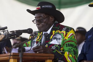 Zimbabwean President Robert Mugabe  prepares to  deliver his  speeh  during his 93rd Birthday celebrations in  Matopos on the outskirts of Bulawayo, Saturday, February, 25, 2017