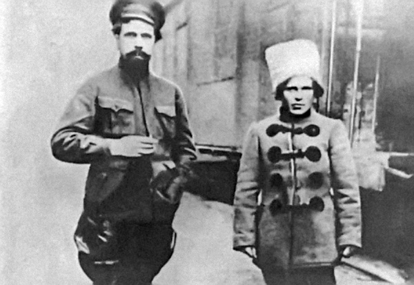 Nestor Makhno by train with very tall man