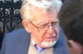 Australian entertainer Rolf Harris leaves a London court during his appeal on Tuesday.