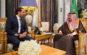 In this photo provided by the Saudi Press Agency, Saudi King Salman, right, meets with outgoing Lebanese Prime Minister Saad Hariri in Riyadh, Saudi Arabia, Monday, Nov. 6, 2017.