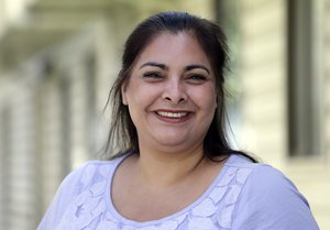 In this Aug. 22, 2017 file photo, Democrat Manka Dhingra, a candidate for Washington state's 45th District Senate seat, poses for a portrait at her campaign headquarters in Redmond, Wash.