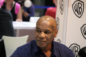 Mike Tyson signing autographs while promoting Mike Tyson Mysteries during the 2017 Comic-Con International at the San Diego Convention Center