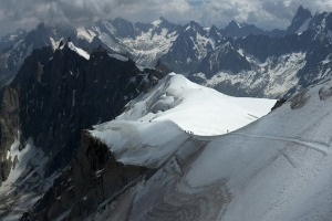 Ice trails. Trekkers climb to the summit of Mont Blanc, the highest peak in Europe. 
