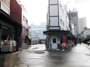 After a rainfall, intersecting streets in Tokyo, Japan appear empty. Taken on May 2014.