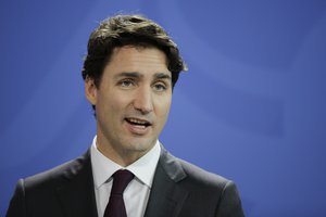 The Prime Minister of Canada Justin Trudeau attends a news conference with German Chancellor Angela Merkel after talks at the chancellery in Berlin, Friday, Feb. 17, 2017. (AP Photo/Markus Schreiber)