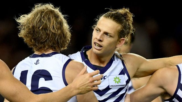 Fremantle star Nat Fyfe trained with an amateur soccer club in Spain during his time off.