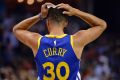 Golden State Warriors guard Stephen Curry has been fined $US50,000 for throwing his mouthguard.