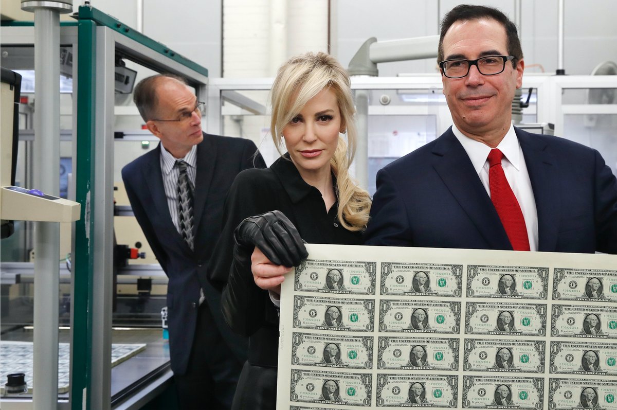 Literally Steve Mnuchin and his wife holding sheets of cash