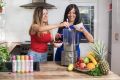 Smoothie Bomb started in Cinzia Cozzolino's (right) kitchen and she enlisted her daughter Lana Hooper (left) to help out. 