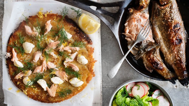 Crispy potato rosti topped with creme fraiche dollops, dill fronds and flaked trout.