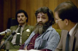 In this 1986 file photo, Convicted killer Charles Manson is seen during a parole hearing in California. In February, 2008, a team of forensic researchers visited the Death Valley ranch where Manson took refuge and found at least two sites that could be clandestine graves holding the bodies of additional victims.  On Tuesday, May 20, 2008 investigators will be back at the ranch again looking at the site. (AP Photo)