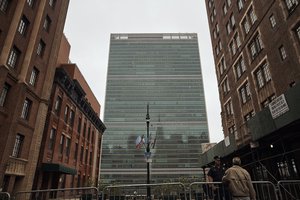 A man talks to a police office outside the UN building, Monday, Sept. 18, 2017 in New York