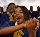 The choir sings at the student graduation ceremony attended by Zimbabwean President Robert Mugabe.