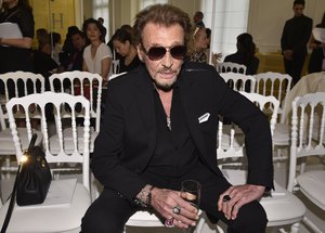 French rock singer Johnny Hallyday waits before Christian Dior's Haute Couture Fall-Winter 2016-2017 fashion collection presented in Paris, France