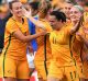 Lapping it up: Lisa De Vanna's celebrates a goal against Brazil in front of nearly 17,000 fans in Penrith.