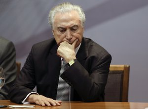 Brazil's President Michel Temer attends a ceremony to announce the creation of a new park and museum at the City Hall, in Sao Paulo, Brazil, Monday, Aug. 7, 2017.