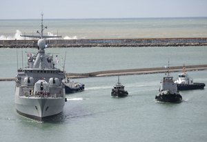 A ship leaves a Naval base to join the search for missing submarine ARA San Juan, in Mar del Plata, Argentina, Monday, Nov. 20, 2017.