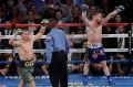 No win situation: Canelo Alvarez, right, and Gennady Golovkin celebrate following the last round.