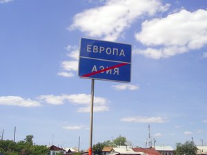 Road sign on the continental border between Europe and Asia near Magnitogorsk, Ural Mountains, Russia