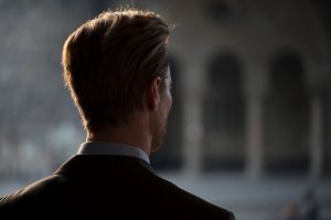 Back view of a young Caucasian businessman.