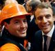 President Emmanuel Macron poses with workers before meeting construction businessmen in Paris in October.