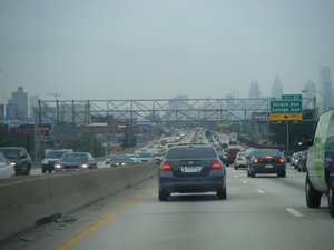 Traffic heading into Philadelphia on Interstate 95 during the morning rush hour. Efforts to manage transportation demand during rush hour periods vary by state and by metropolitan area.