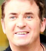 Say cheese! Shane Richie flashed a beaming smile as he headed into BBC Studios Salford