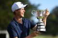 Unlikely triumph: Cameron Davis with the trophy.