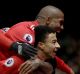 Manchester United's Jesse Lingard celebrates  with double-goal scorer Ashley Young.