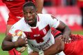 Quirky: Jermaine McGillvary has been known to sing to himself before receiving the ball.